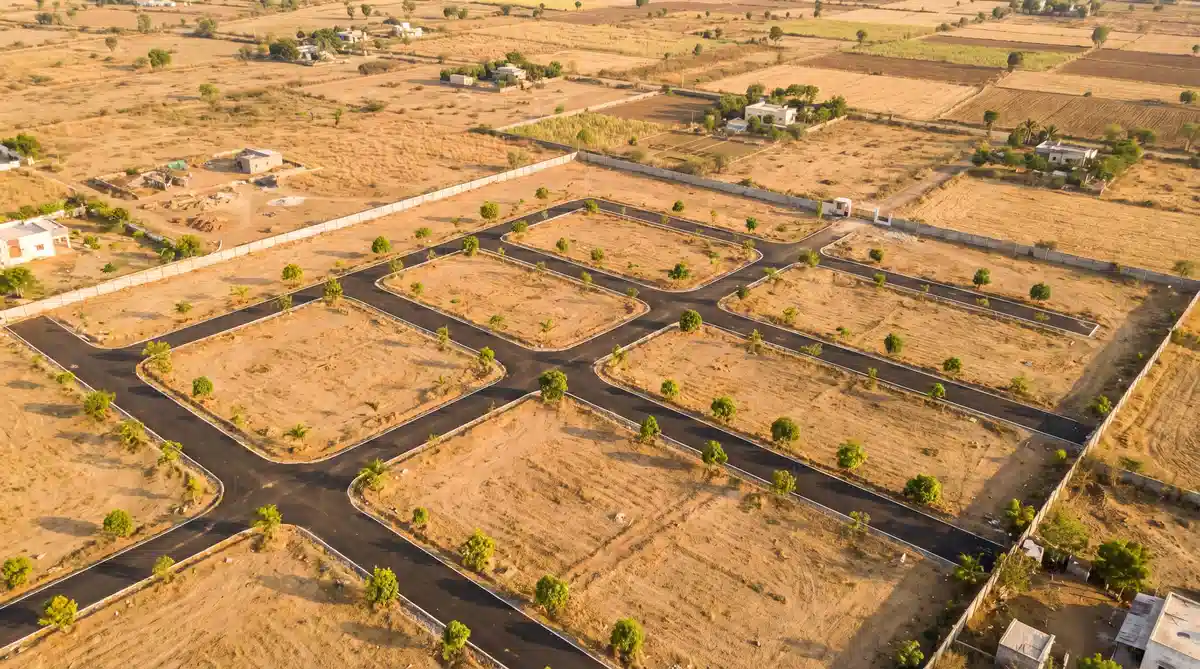 Land in Guntur — open plots and greenfield layouts with road access